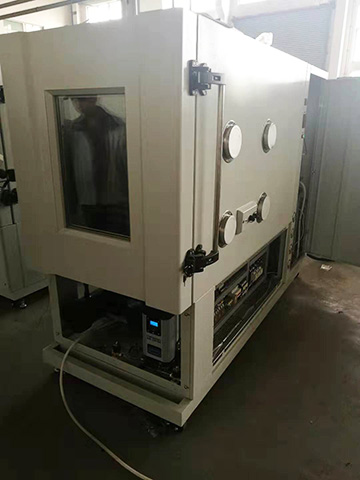 英國小型模塊干燥機集成到高低溫環境試驗箱里的照片